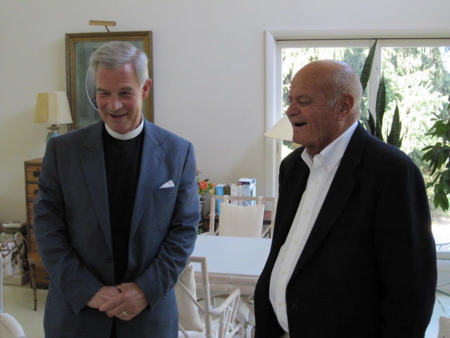 Henry Willard, a well-known community member, reminisces with the Rev. GT Schramm, rector of Shepherdstown’s Trinity Episcopal Church, who he met 37 years ago.